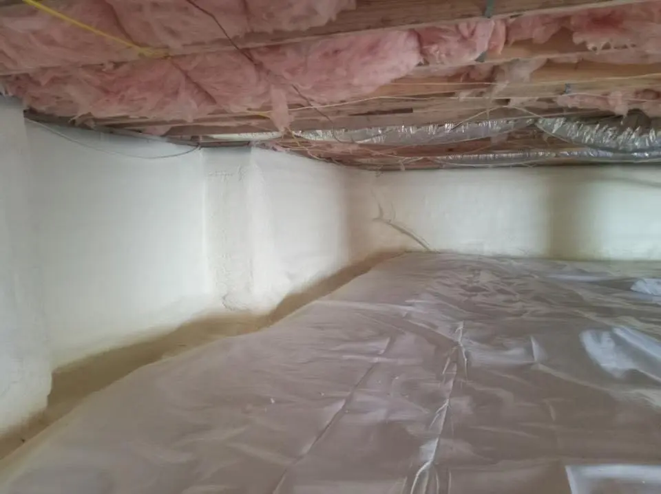 Crawl space encapsulation with closed-cell spray foam for Commercial Roof Restoration in Hollywood